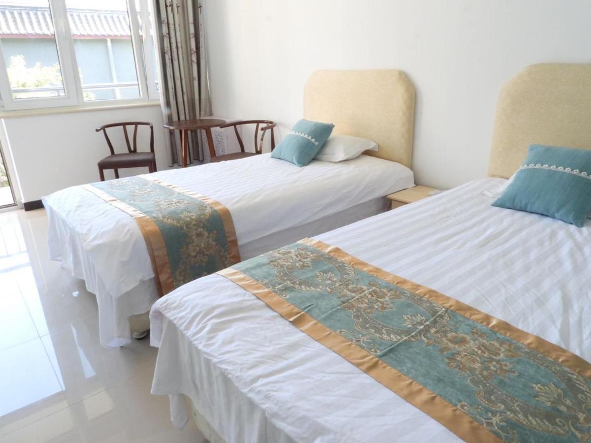 הואירו Beijing Huanghuacheng Water Great Wall Derunju Guesthouse מראה חיצוני תמונה