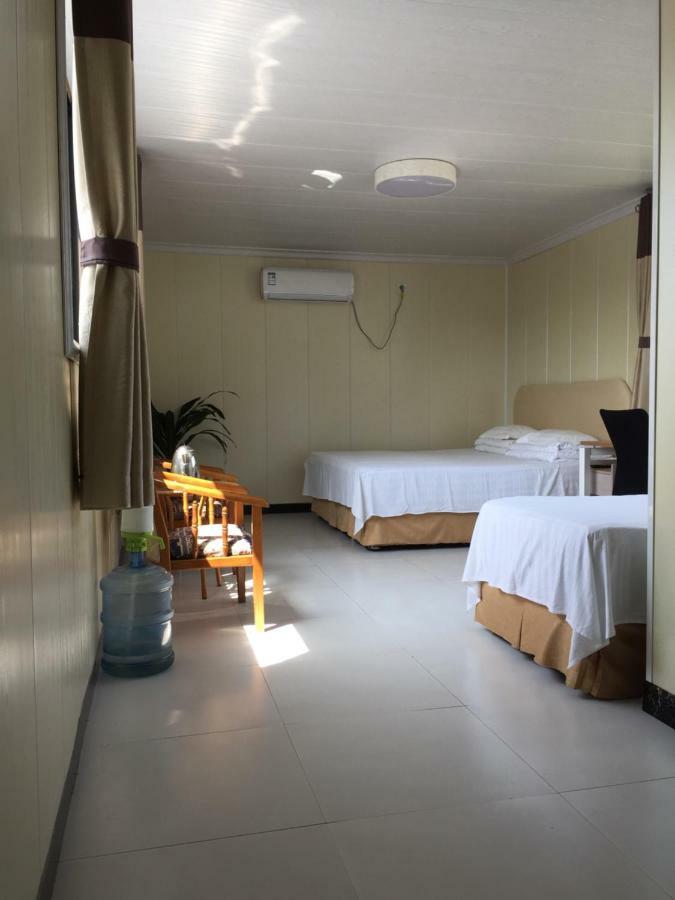 הואירו Beijing Huanghuacheng Water Great Wall Derunju Guesthouse מראה חיצוני תמונה